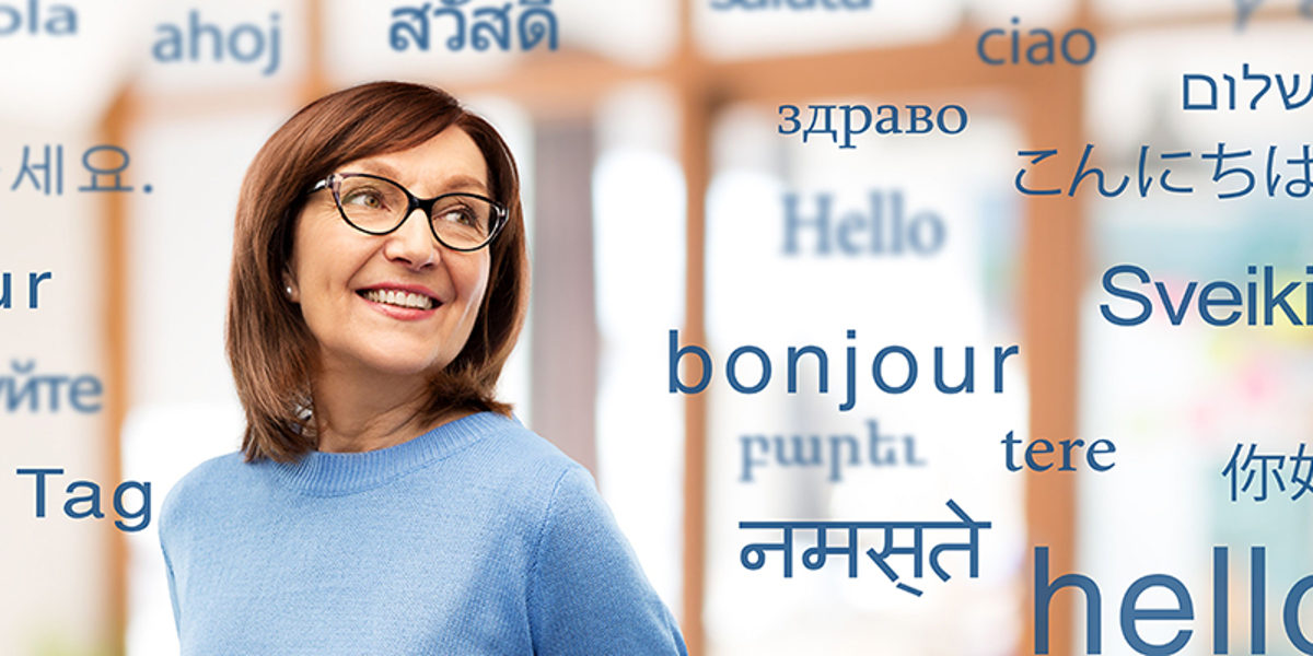 vision and old people concept - smiling senior woman in glasses over greeting words in different foreign languages Schlagwort(e): woman, old, senior, translator, language, foreign, business, businesswoman, translation, speech, translate, multilingual, dictionary, international, office, hello, hi, world, many, education, talk, speak, various, entrepreneur, professional, occupation, communication, specialist, polyglot, knowledge, learning, vocabulary, word, glasses, mature, adult, beautiful, female, elderly, aged, retired, 60s, person, people, concept, background, smiling, happy, copyspace, copy space
