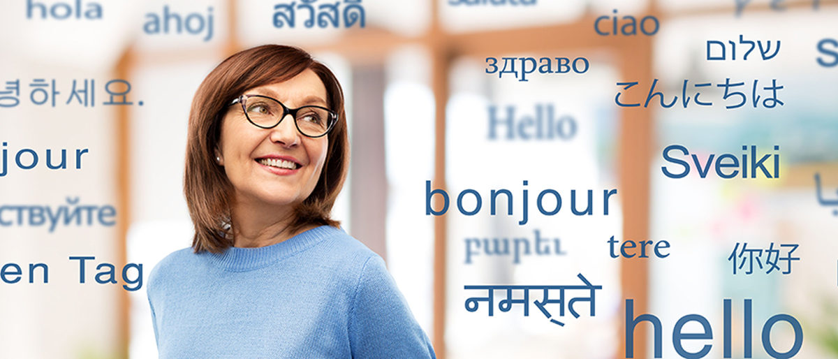 vision and old people concept - smiling senior woman in glasses over greeting words in different foreign languages Schlagwort(e): woman, old, senior, translator, language, foreign, business, businesswoman, translation, speech, translate, multilingual, dictionary, international, office, hello, hi, world, many, education, talk, speak, various, entrepreneur, professional, occupation, communication, specialist, polyglot, knowledge, learning, vocabulary, word, glasses, mature, adult, beautiful, female, elderly, aged, retired, 60s, person, people, concept, background, smiling, happy, copyspace, copy space